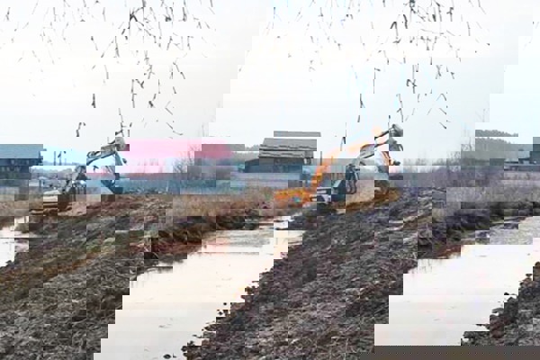 Excavator During The Work